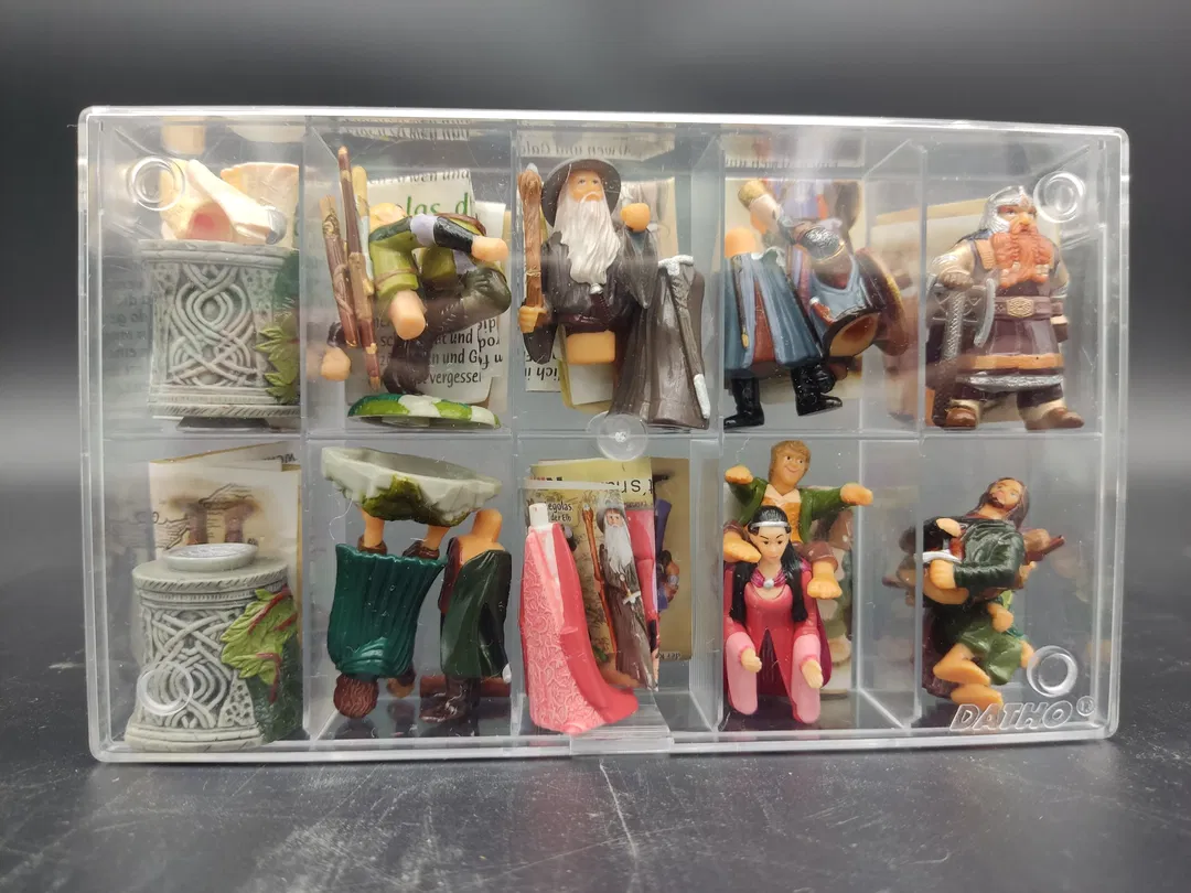19 Sammelboxen mit Kinderüberraschungs-Figuren - Bild 1