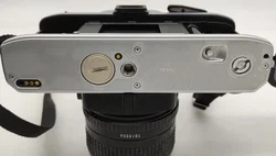 Minolta X 300 Spiegelreflexkamera mit 3 Objektiv 28mm ,50mm ,135mm mit Blitz und Tasche – Vorschau 12