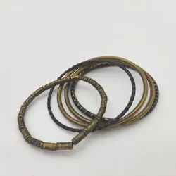 5 Armbänder schwarz, goldfarben - Gr. S/M - Bild 2