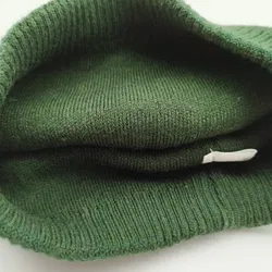 Grüne Wintermütze im Perlen-Look - 85% Viskose, 10% Kaschmir, 5% Elasthan - Bild 3