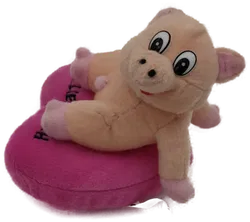 Schweinchen auf einem Herz 