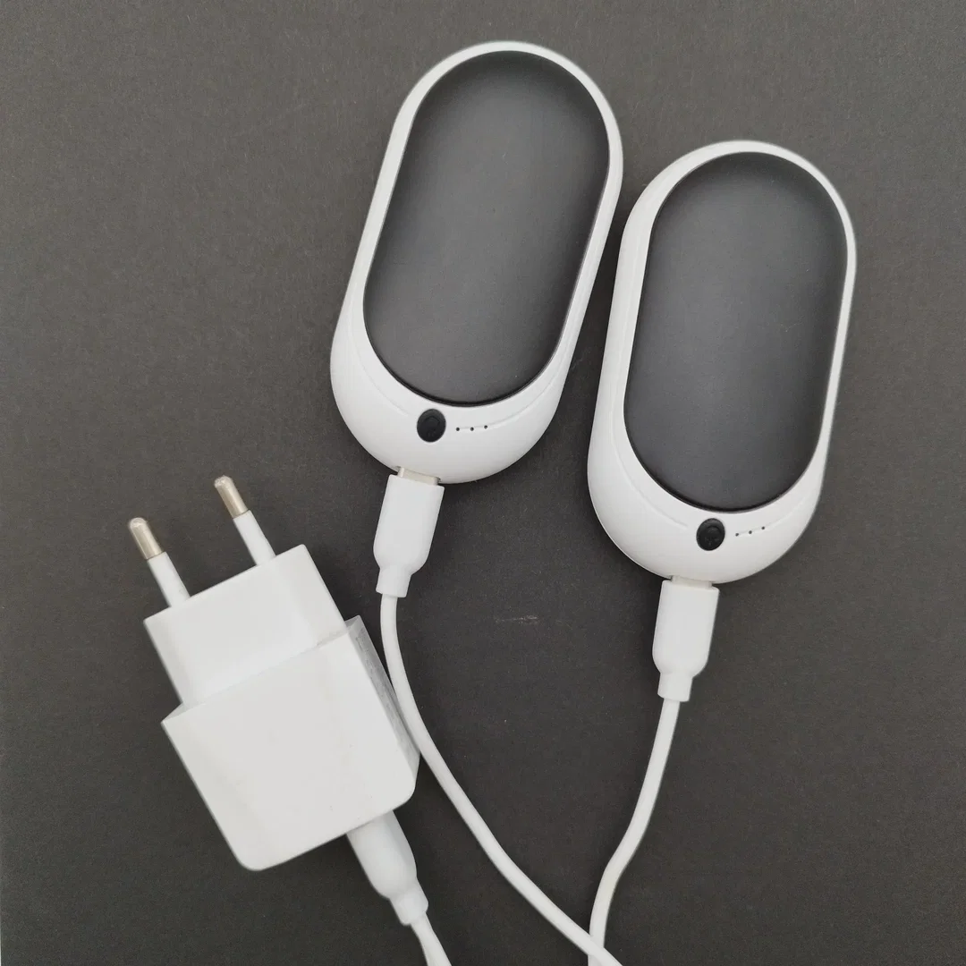 Elektrischer Handwärmer 2er Set, aufladbar, inkl. Ladekabel| Praktischer Begleiter - Bild 1